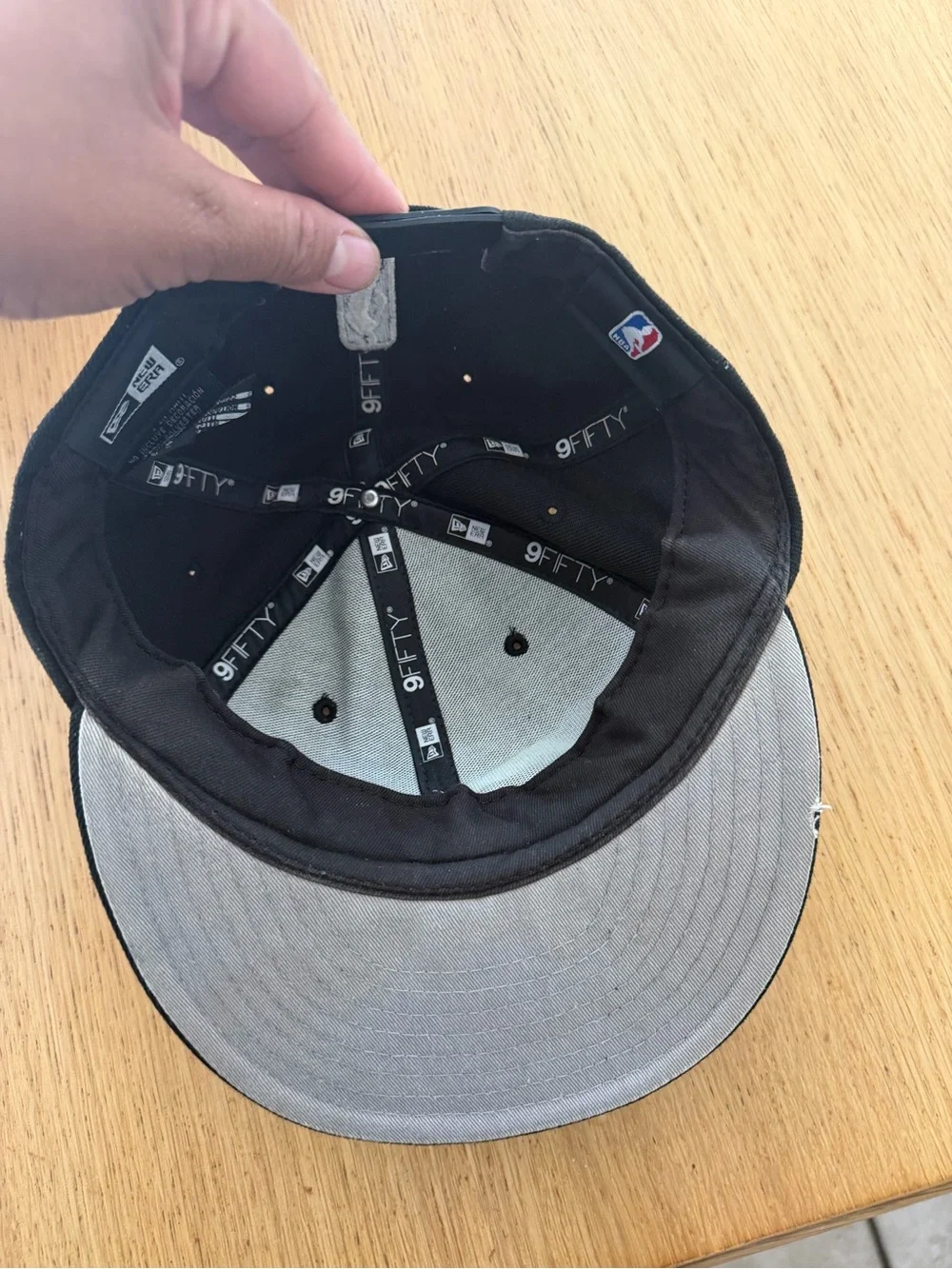 New Era Lakers Black Snapback with Purple and Gold Logo